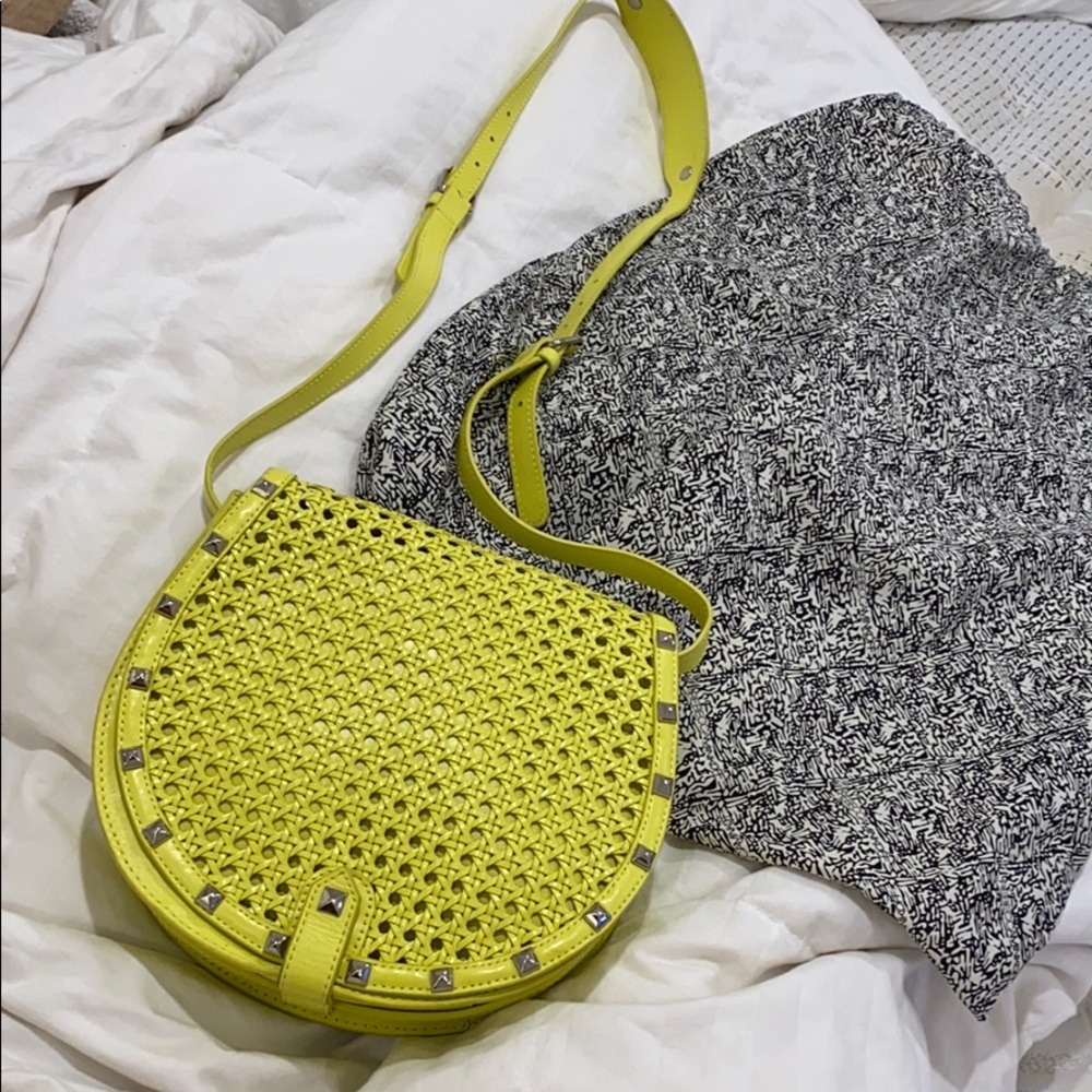 Bright yellow crossbody with silver stud hardware